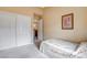This bedroom features a large closet, neutral walls, and a serene atmosphere at 8416 Dry Cliff Cir, Las Vegas, NV 89128