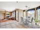 Cozy breakfast nook with tile floors, pendant lighting, and views of the backyard at 8416 Dry Cliff Cir, Las Vegas, NV 89128