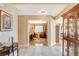 Open foyer with tile floors leads to a cozy office and living spaces at 8416 Dry Cliff Cir, Las Vegas, NV 89128