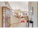 Foyer with tile floors, grand staircase, and views to the living room at 8416 Dry Cliff Cir, Las Vegas, NV 89128