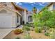 Charming single Gathering home with well-kept desert landscaping and two-car garage at 8416 Dry Cliff Cir, Las Vegas, NV 89128