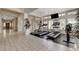 Bright community gym with treadmills, ellipticals, and large windows for natural light at 8416 Dry Cliff Cir, Las Vegas, NV 89128