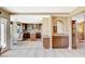 Open-concept kitchen with granite countertops and stainless steel appliances at 8416 Dry Cliff Cir, Las Vegas, NV 89128