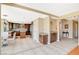Eat-in kitchen features granite countertops, stainless steel appliances, and tiled floors at 8416 Dry Cliff Cir, Las Vegas, NV 89128