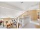 Hallway overlooking the living room with an arch window at 8416 Dry Cliff Cir, Las Vegas, NV 89128
