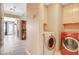 Convenient laundry area with side by side, front loading washer and dryer at 8416 Dry Cliff Cir, Las Vegas, NV 89128