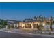 Expansive property with a three-car garage, stone accents, and meticulous desert landscaping at 9 Rue Grimaldi Way, Henderson, NV 89011
