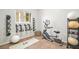 Home gym with exercise equipment and weights, perfect for staying active and healthy at 10920 Grand Haven Ave, Las Vegas, NV 89134