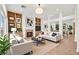 Bright living room featuring built-in shelves, fireplace, and stylish furniture for a cozy atmosphere at 10920 Grand Haven Ave, Las Vegas, NV 89134