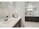 Bright and modern bathroom with double vanity, quartz countertops, and stylish fixtures at 113 Manzanita Falls Ave, North Las Vegas, NV 89031