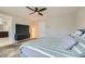 Comfortable Primary bedroom with stylish furniture, neutral tones, and cozy atmosphere at 113 Manzanita Falls Ave, North Las Vegas, NV 89031