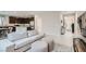Open-concept living area connecting to the kitchen, showcasing modern furniture and neutral decor at 113 Manzanita Falls Ave, North Las Vegas, NV 89031