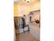 Walk-in closet with ample hanging space, shelving, drawers, and organized storage at 11830 Portina Dr # 2030, Las Vegas, NV 89138