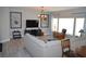 Spacious living room featuring contemporary art, media console, and comfortable seating area at 11830 Portina Dr # 2030, Las Vegas, NV 89138