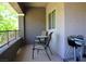 Cozy patio with a table and chairs, perfect for outdoor dining and relaxation at 11830 Portina Dr # 2030, Las Vegas, NV 89138
