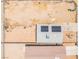 Aerial view of a home featuring solar panels and a spacious backyard with construction materials at 1328 Balzar Ave, Las Vegas, NV 89106