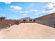 Expansive backyard featuring a temporary structure frame, block walls, and abundant open space at 1328 Balzar Ave, Las Vegas, NV 89106