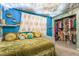 Unique bedroom with cloud ceiling, eclectic decorations, and closet with ample storage at 1328 Balzar Ave, Las Vegas, NV 89106