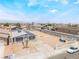 An aerial view of a well-placed home with solar panels and a large, open front yard in a tranquil neighborhood setting at 1328 Balzar Ave, Las Vegas, NV 89106