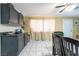 Bright kitchen and dining space with view of decorative wallpaper and lots of natural light at 1328 Balzar Ave, Las Vegas, NV 89106