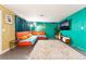Bright living room featuring modern furniture, a large rug, and eclectic wall decor at 1328 Balzar Ave, Las Vegas, NV 89106