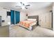Spacious main bedroom featuring a ceiling fan, carpet floors, and natural light at 1328 Balzar Ave, Las Vegas, NV 89106