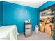 Storage area featuring a mini fridge, boxes, and a closet at 1328 Balzar Ave, Las Vegas, NV 89106