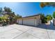 Spacious three-car garage with extended driveway offers ample parking and storage at 1561 Doran Dr, Las Vegas, NV 89123