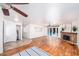A spacious and bright living room with hardwood floors, fireplace and large window at 1561 Doran Dr, Las Vegas, NV 89123