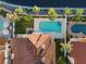 An aerial view highlights a private backyard pool and patio, nestled among manicured lawns and mature landscaping at 1905 Iron Ridge Dr, Las Vegas, NV 89117