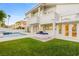 A gorgeous backyard features a built-in grill and a pristine pool, perfect for entertaining at 1905 Iron Ridge Dr, Las Vegas, NV 89117
