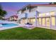 The backyard has a pool and outdoor kitchen at 1905 Iron Ridge Dr, Las Vegas, NV 89117