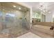 Bathroom with large walk-in shower and a separate tub at 1905 Iron Ridge Dr, Las Vegas, NV 89117