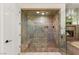 Large marble shower with a separate door to the main part of the bathroom at 1905 Iron Ridge Dr, Las Vegas, NV 89117