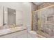 Bathroom with unique tile shower enclosure, and an off-white vanity at 1905 Iron Ridge Dr, Las Vegas, NV 89117