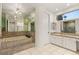 Bathroom with large bathtub, large vanity and a separate shower area at 1905 Iron Ridge Dr, Las Vegas, NV 89117