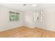 This bedroom is bright with lots of natural light and wood flooring at 1905 Iron Ridge Dr, Las Vegas, NV 89117