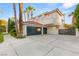 A spacious three-car garage and gated driveway provide ample parking at this lovely home at 1905 Iron Ridge Dr, Las Vegas, NV 89117