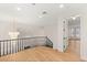 Upstairs landing with chandelier overlooking the home's entry at 1905 Iron Ridge Dr, Las Vegas, NV 89117