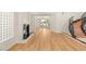 Spacious living room with fireplace, hardwood floors, and natural light at 1905 Iron Ridge Dr, Las Vegas, NV 89117