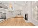 Bright open living room with fireplace and gorgeous chandelier at 1905 Iron Ridge Dr, Las Vegas, NV 89117