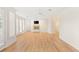 Bright living room features hardwood floors, fireplace, and large windows with white shutters at 1905 Iron Ridge Dr, Las Vegas, NV 89117