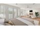 Bright main bedroom features shutters, fireplace, and neutral decor at 1905 Iron Ridge Dr, Las Vegas, NV 89117
