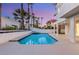 The private pool is surrounded by mature landscaping at 1905 Iron Ridge Dr, Las Vegas, NV 89117