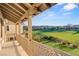 Balcony overlooks beautiful landscaping, golf course, desert landscaping and custom railing at 1987 Orchard Mist St, Las Vegas, NV 89135