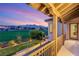 Balcony overlooking golf course with mountain views and manicured landscaping at 1987 Orchard Mist St, Las Vegas, NV 89135