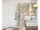 Modern bathroom featuring a glass shower, double sink, and decorative light fixtures at 1987 Orchard Mist St, Las Vegas, NV 89135