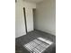 Bright bedroom with gray carpet, baseboards, and natural light at 220 Mission Catalina Ln # 203, Las Vegas, NV 89107