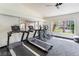 Well-equipped fitness area with modern treadmills and stationary bikes, overlooking scenic views at 221 Mission Catalina Ln # 104, Las Vegas, NV 89107