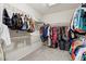 Walk-in closet with ample shelving and hanging space, perfect for organized storage at 2555 Moonlight Valley Ave, Henderson, NV 89044